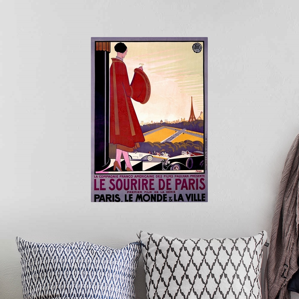 A bohemian room featuring Big, vertical, vintage advertisement for the French film Le Sourire de Paris, a woman in an extra...
