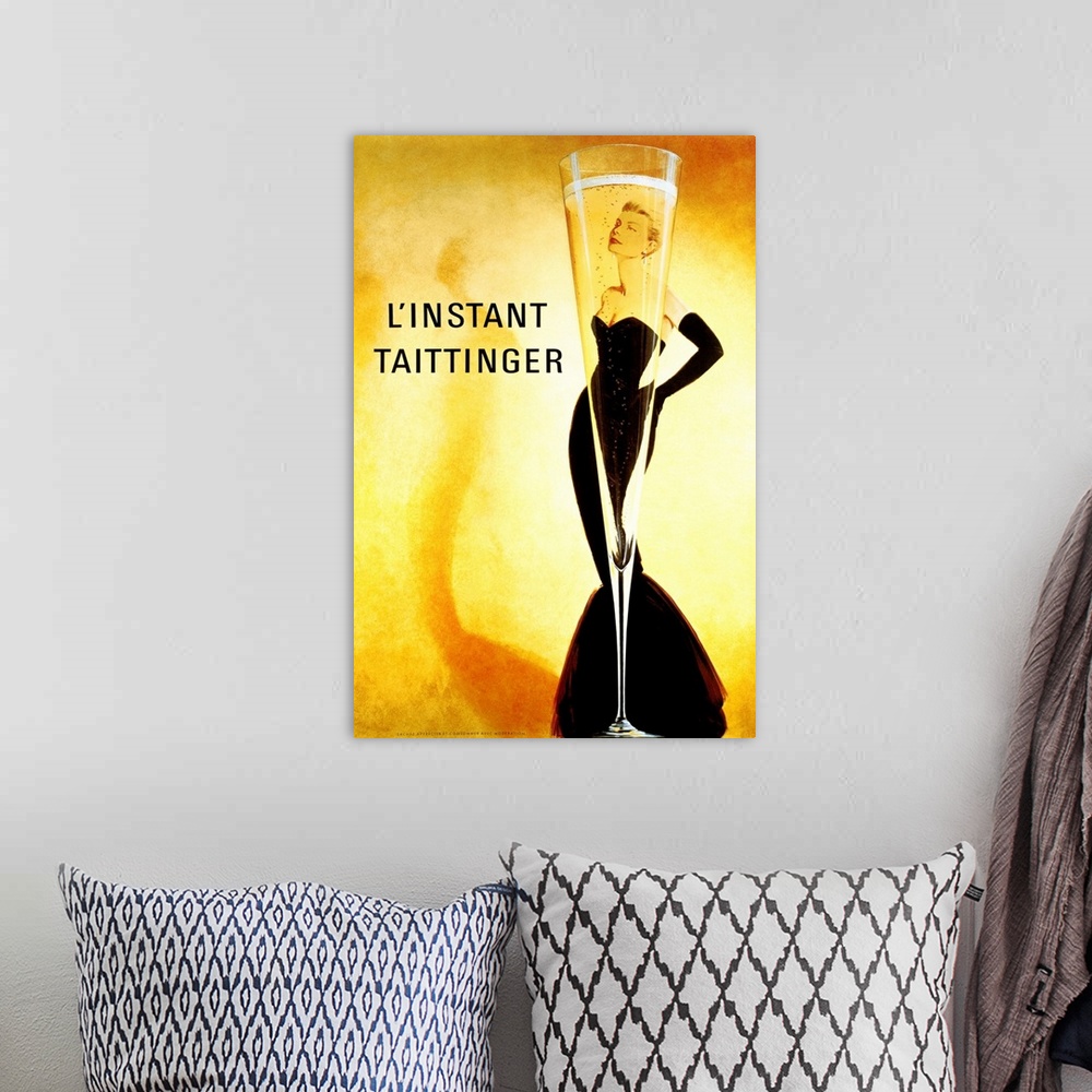 A bohemian room featuring Big print of a slender champagne filled glass with a woman posing seen through it.