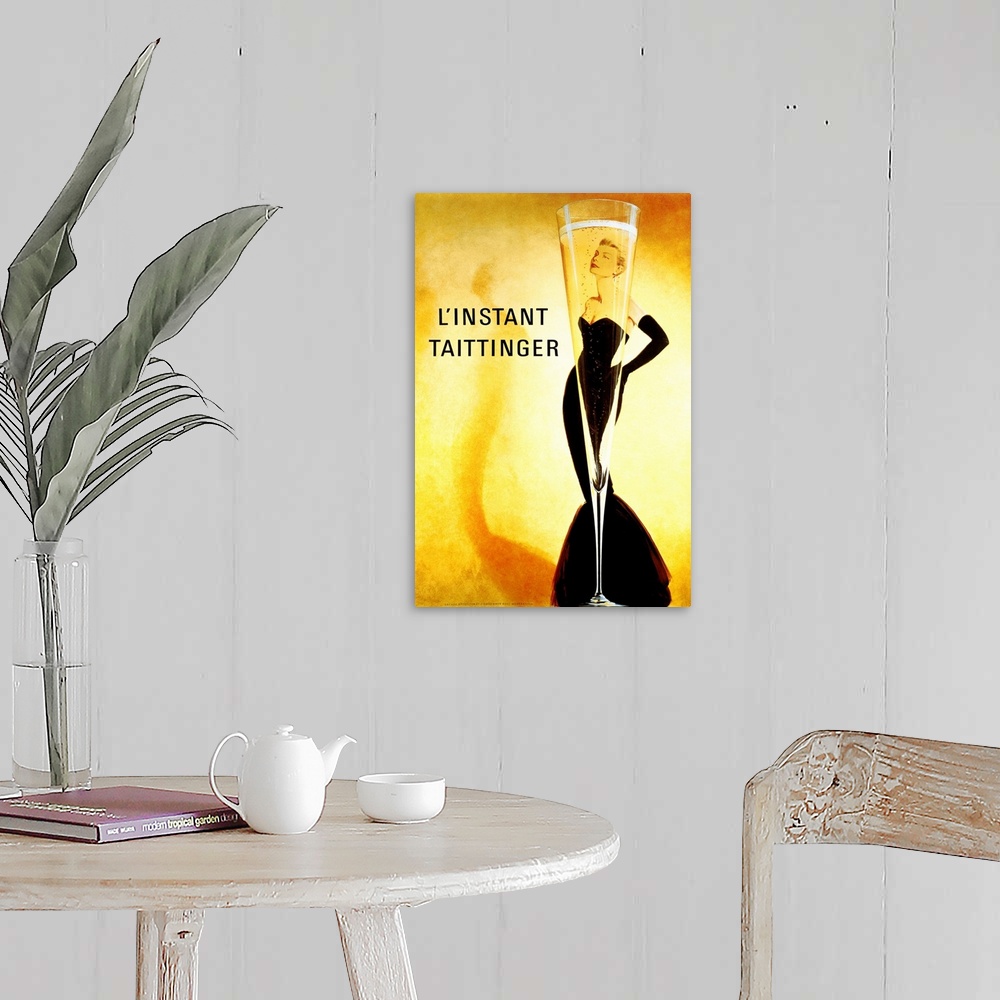 A farmhouse room featuring Big print of a slender champagne filled glass with a woman posing seen through it.