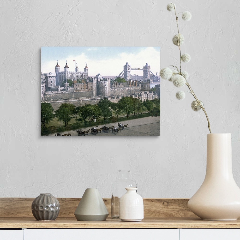 A farmhouse room featuring A vintage urban landscape photograph of the Tower of London with horse drawn carts outside that h...