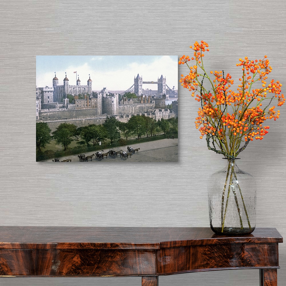 A traditional room featuring A vintage urban landscape photograph of the Tower of London with horse drawn carts outside that h...