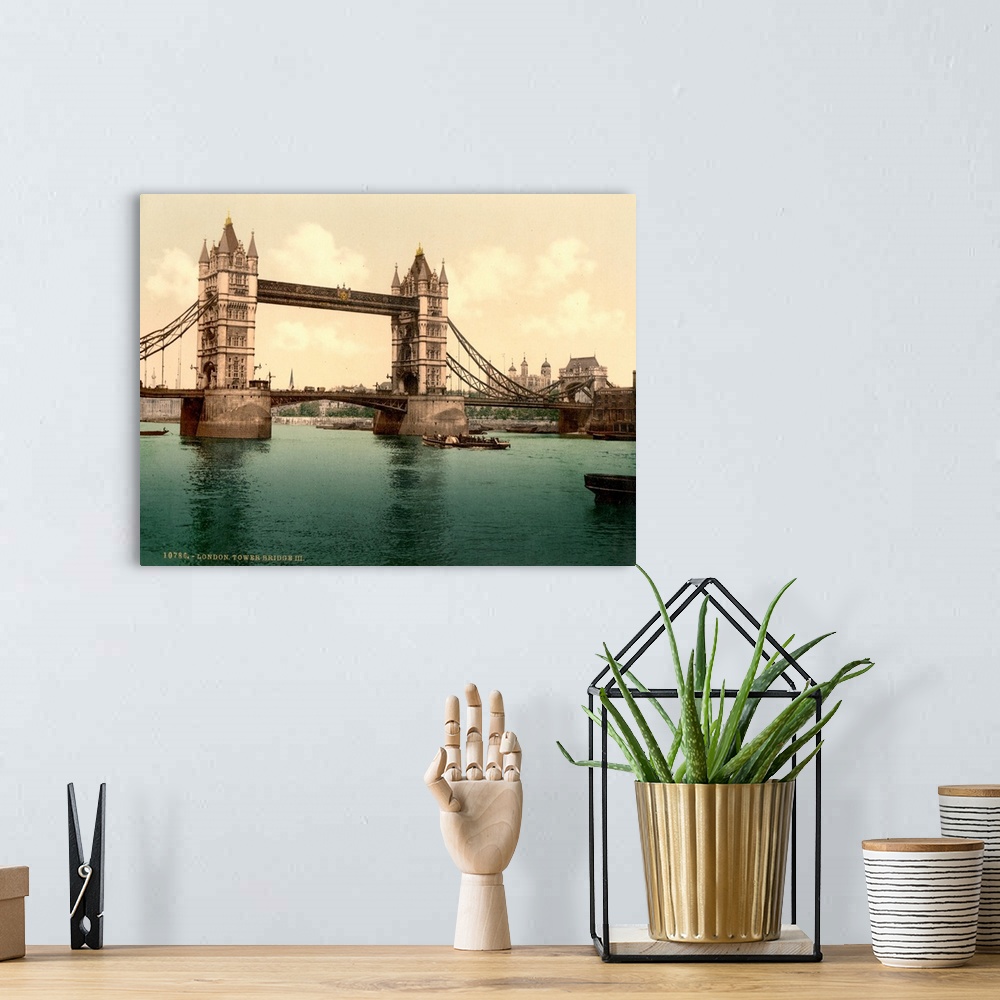 A bohemian room featuring Hand colored photograph of London tower bridge.