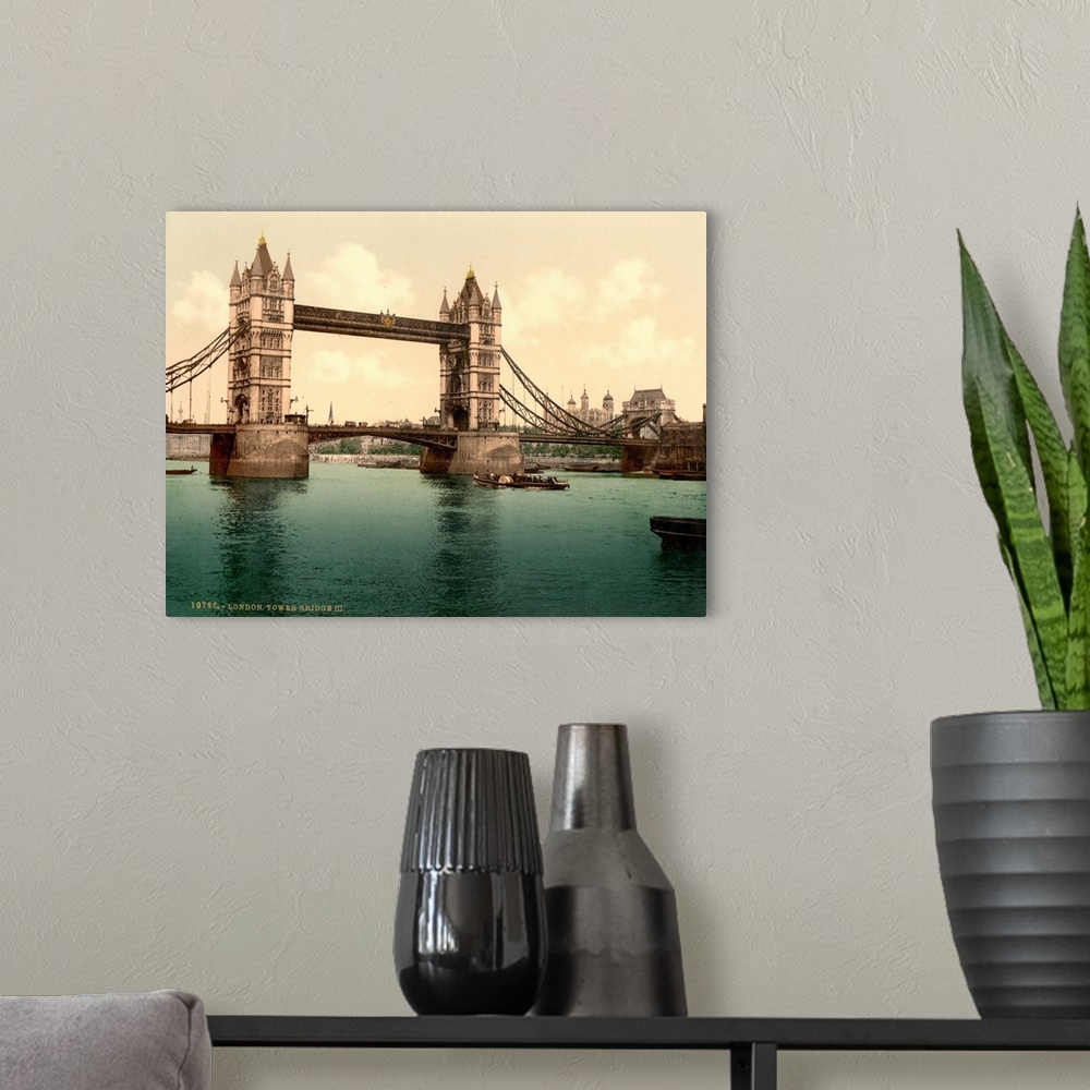 A modern room featuring Hand colored photograph of London tower bridge.