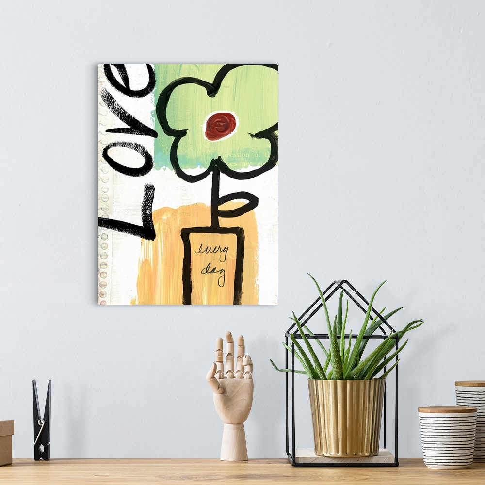 A bohemian room featuring Simple artwork of a flower in a vase and the word "love," drawn in thick brushstrokes on a piece ...