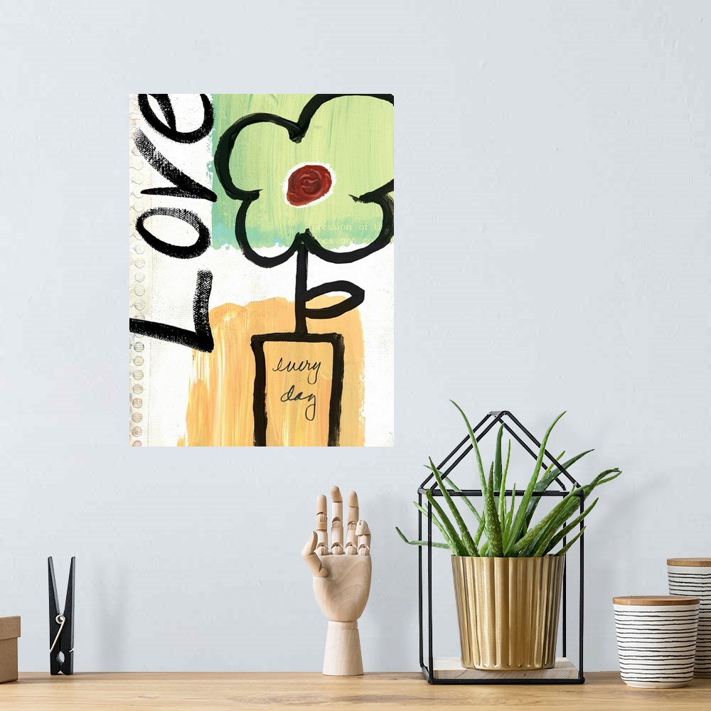 A bohemian room featuring Simple artwork of a flower in a vase and the word "love," drawn in thick brushstrokes on a piece ...