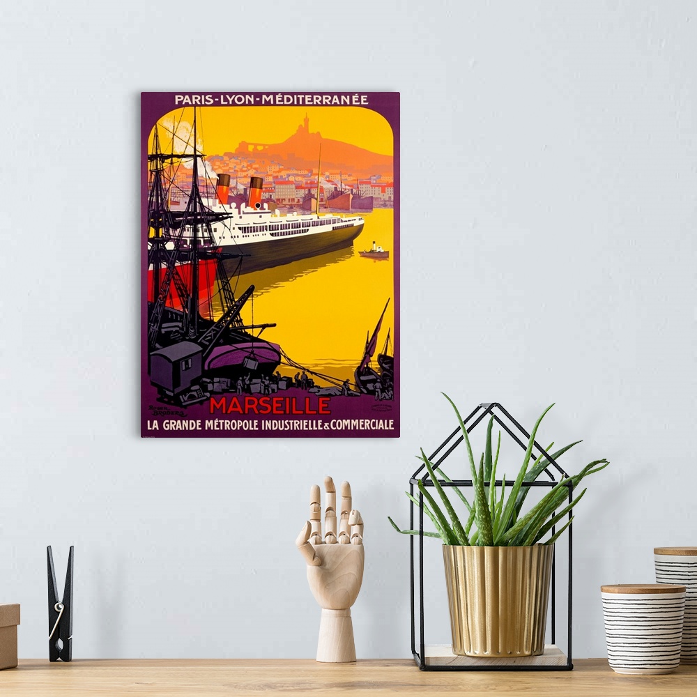 A bohemian room featuring Art Deco style advertising print.  A huge ship with city in the distance and loading dock in the ...
