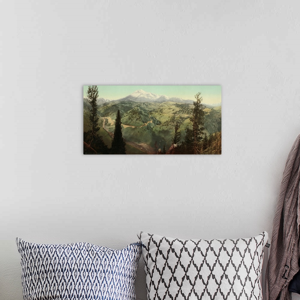 A bohemian room featuring Hand colored photograph of Marshall pass, Colorado.