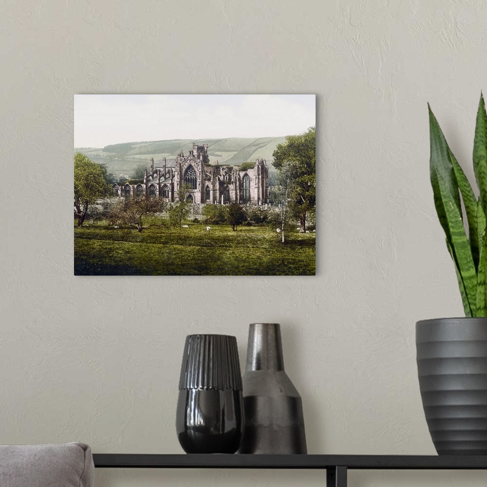 A modern room featuring Melrose Abbey