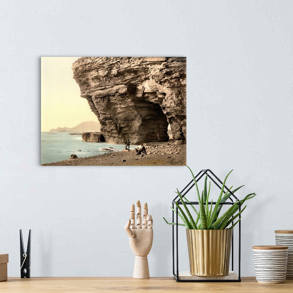 A bohemian room featuring Hand colored photograph of Menawn cliffs, Achill, country mayo, Ireland.