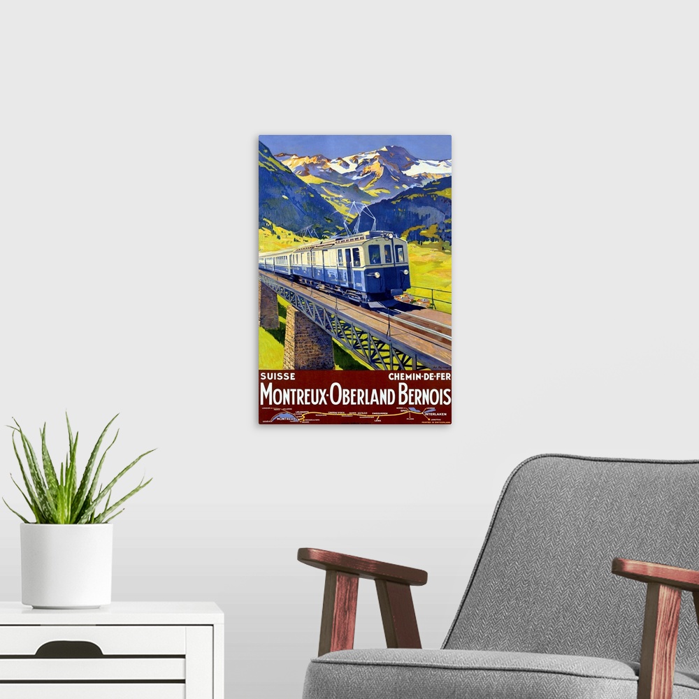 A modern room featuring Old advertising print for train.  There is an image of train crossing a  bridge with snow covered...