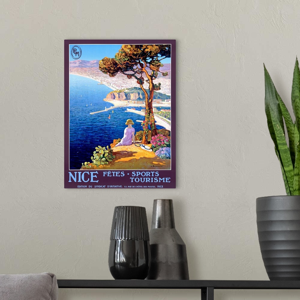 A modern room featuring Vertical, large vintage advertisement for the Festival of Sports and Tourism in Nice.  Woman sitt...