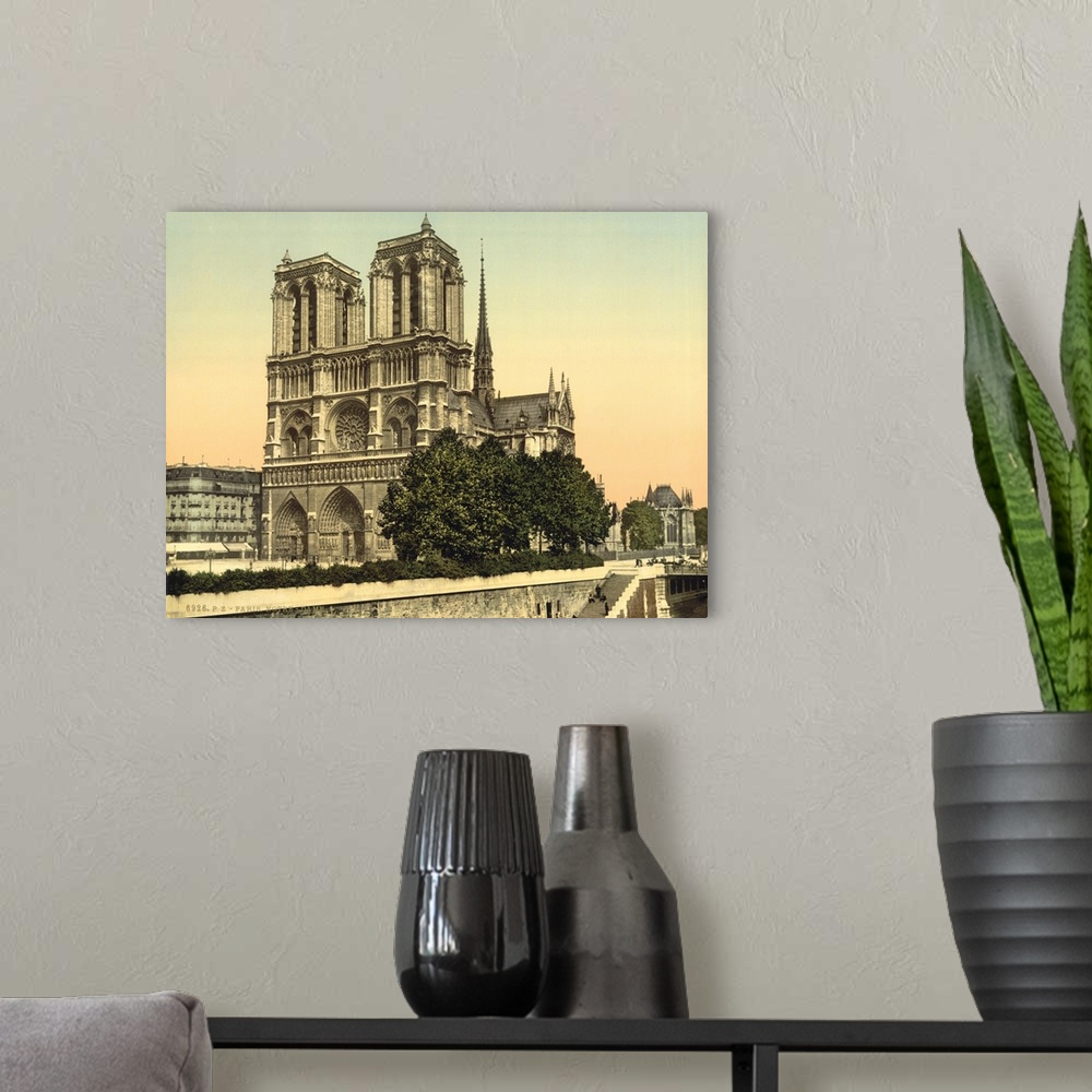 A modern room featuring Hand colored photograph of Notre dame, Paris, France.