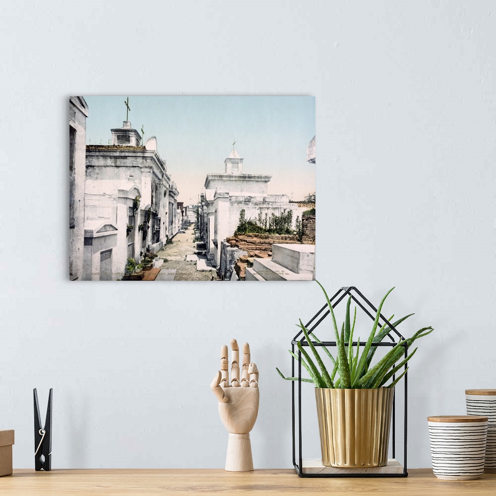 A bohemian room featuring Antiqued photo of a cemetery in New Orleans printed on to canvas.