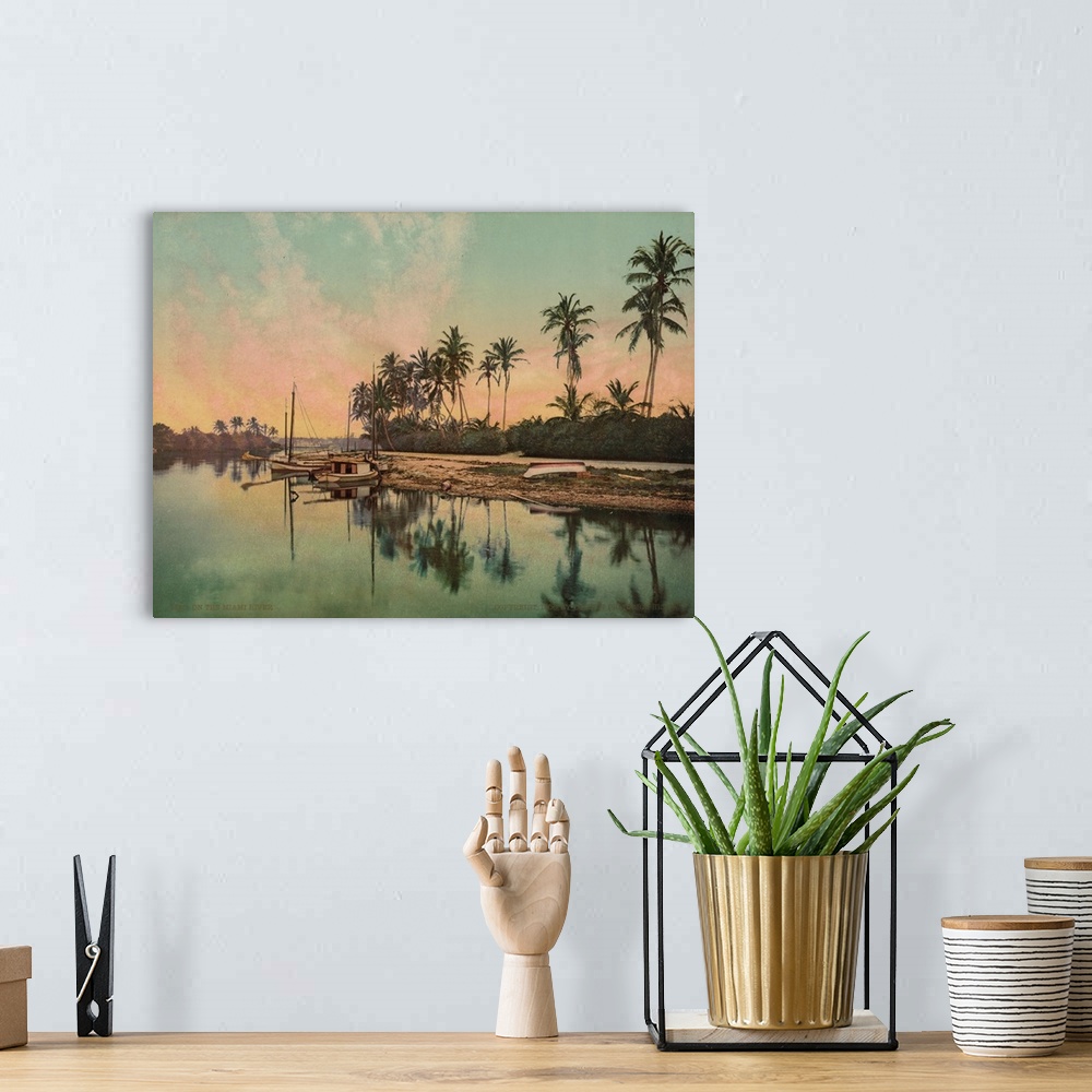 A bohemian room featuring Hand colored photograph of on the Miami river.