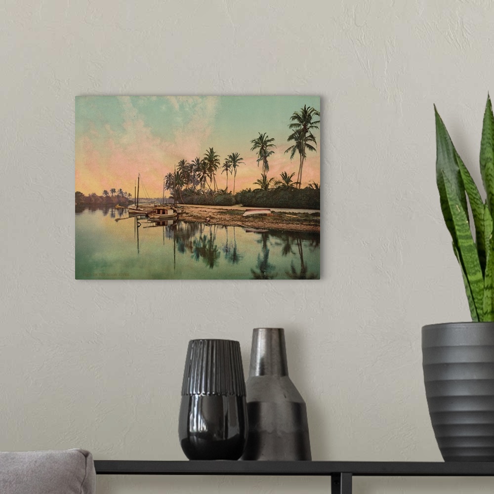 A modern room featuring Hand colored photograph of on the Miami river.