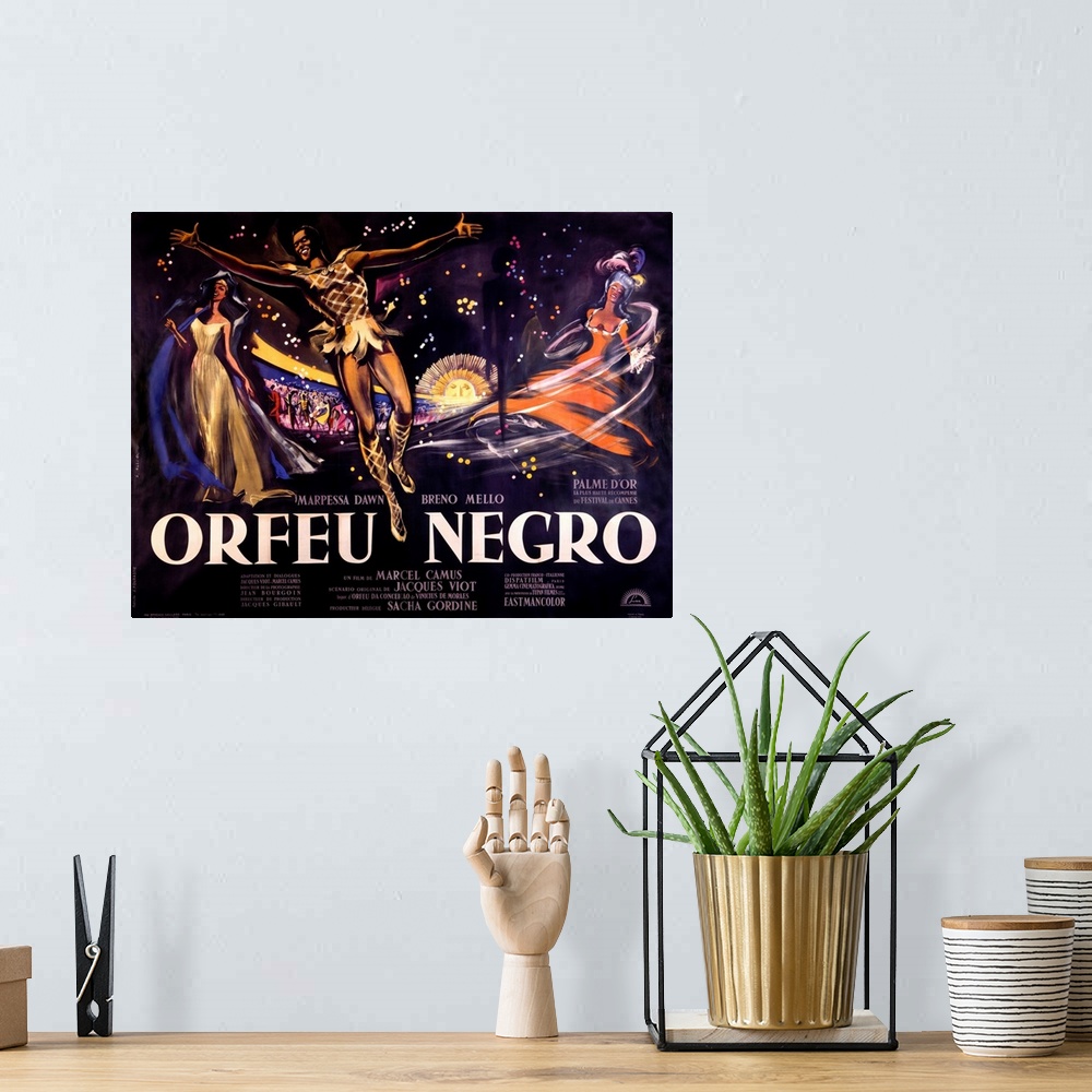 A bohemian room featuring Vintage poster of the Orefu Negro. Three characters are drawn in the foreground all in movement a...
