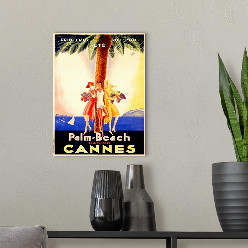 A modern room featuring Old stylized travel poster for a casino in France with three women leaning against a palm tree an...