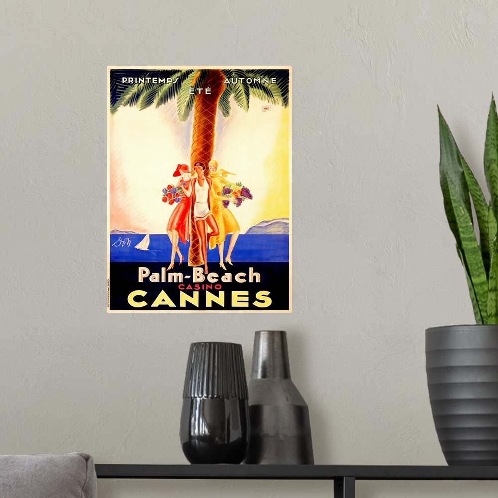 A modern room featuring Old stylized travel poster for a casino in France with three women leaning against a palm tree an...