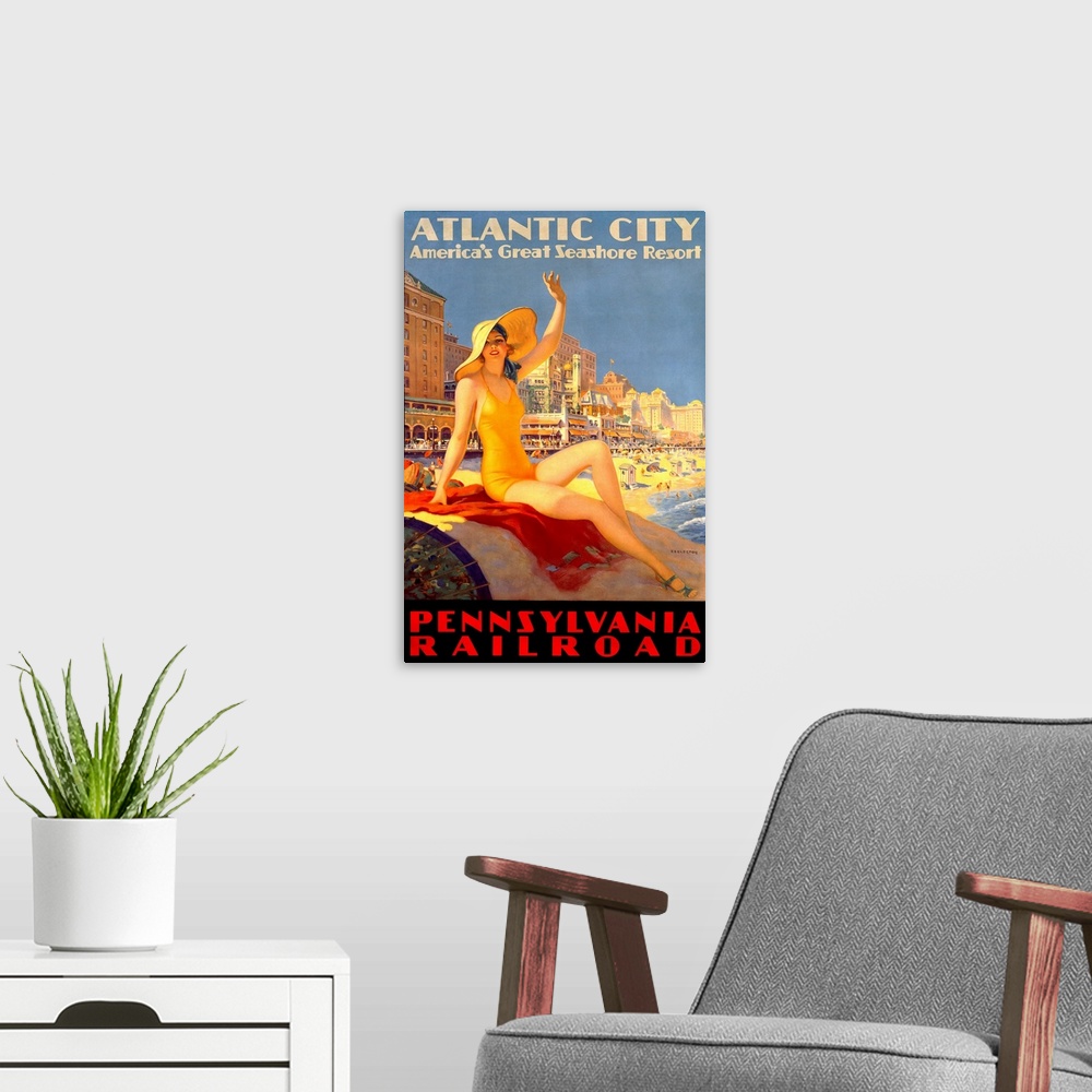 A modern room featuring Antique poster advertising beach resort.  A woman in a swimsuit and hat sits on a rock waving wit...