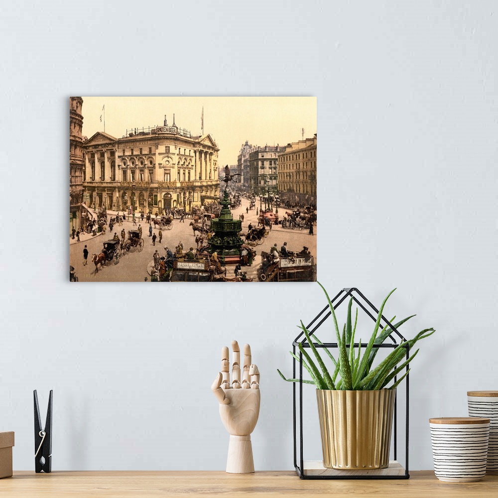 A bohemian room featuring Hand colored photograph of piccadilly circus, London.