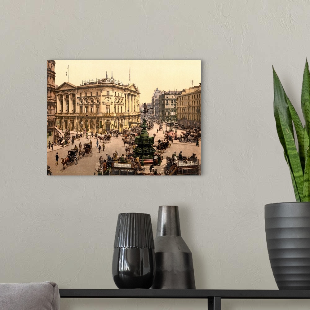 A modern room featuring Hand colored photograph of piccadilly circus, London.