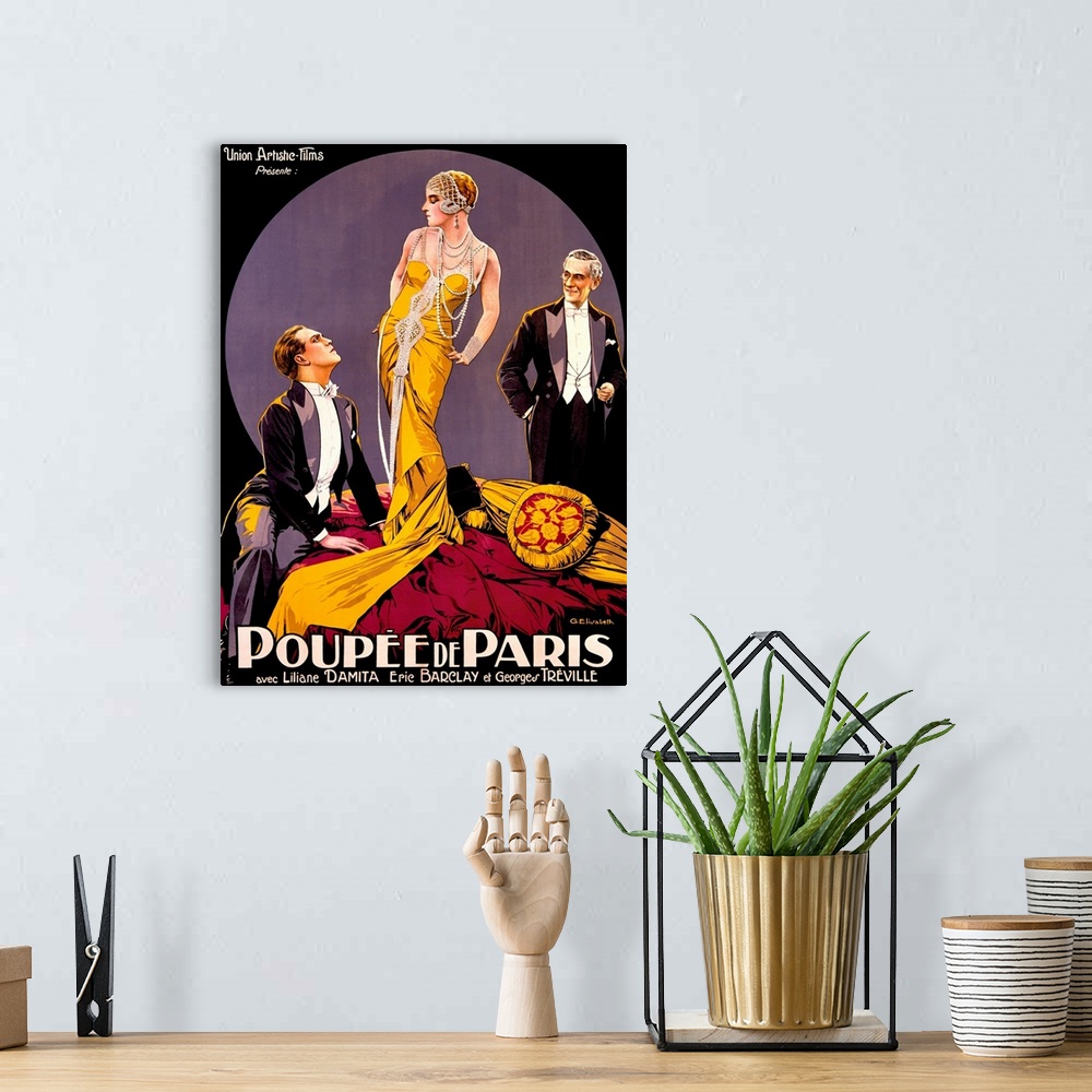 A bohemian room featuring A large vertical vintage poster with two men in tuxedos staring at a tall woman in the center wea...