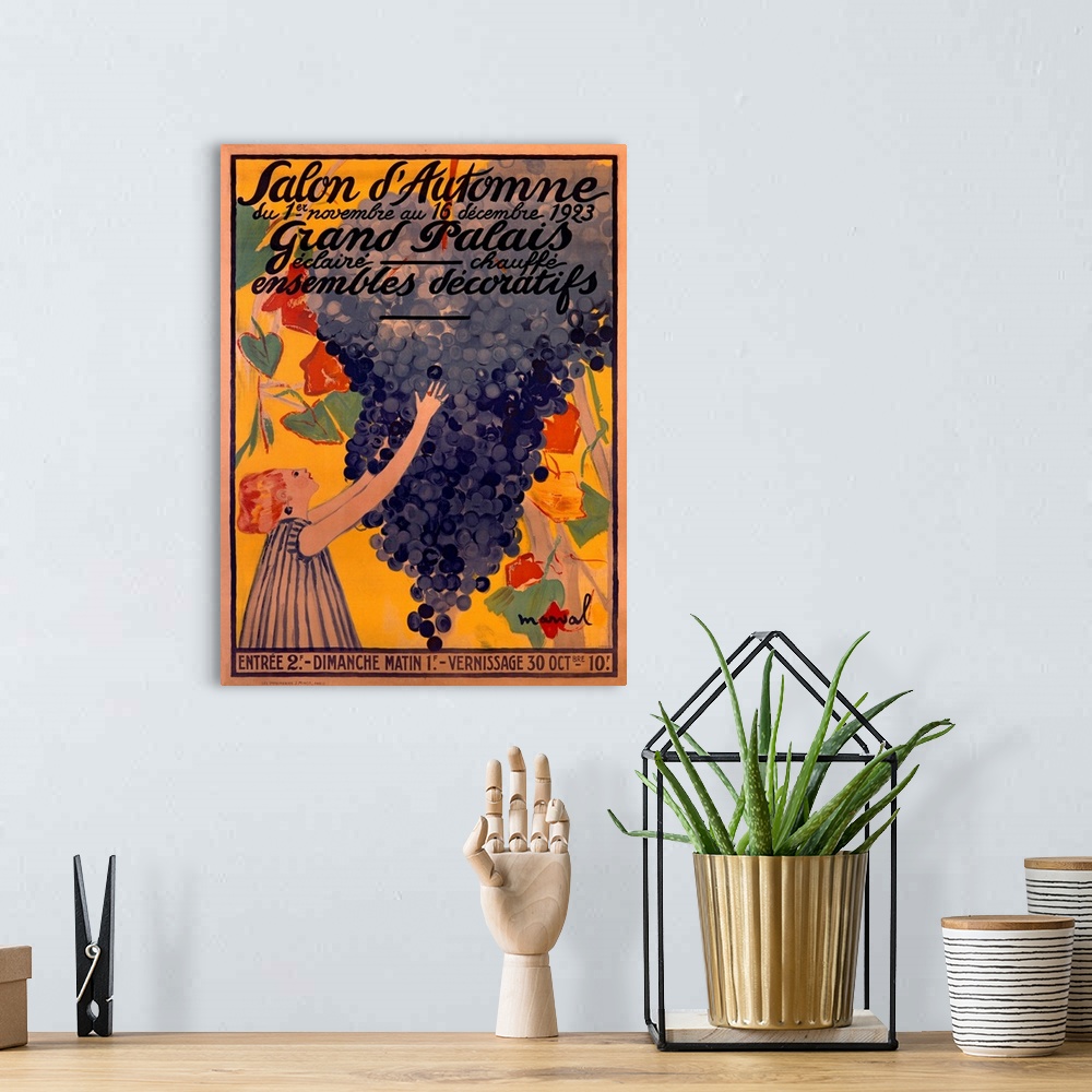 A bohemian room featuring Antiqued poster painting of a girl reaching out and grabbing an oversized bunch of grapes.