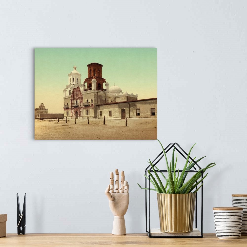A bohemian room featuring Hand colored photograph of San Xavier mission, Tucson, Arizona.