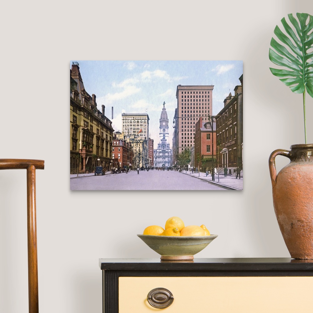 A traditional room featuring Giant, landscape, vintage photograph looking down South Broad Street in Philadelphia, a row of bu...