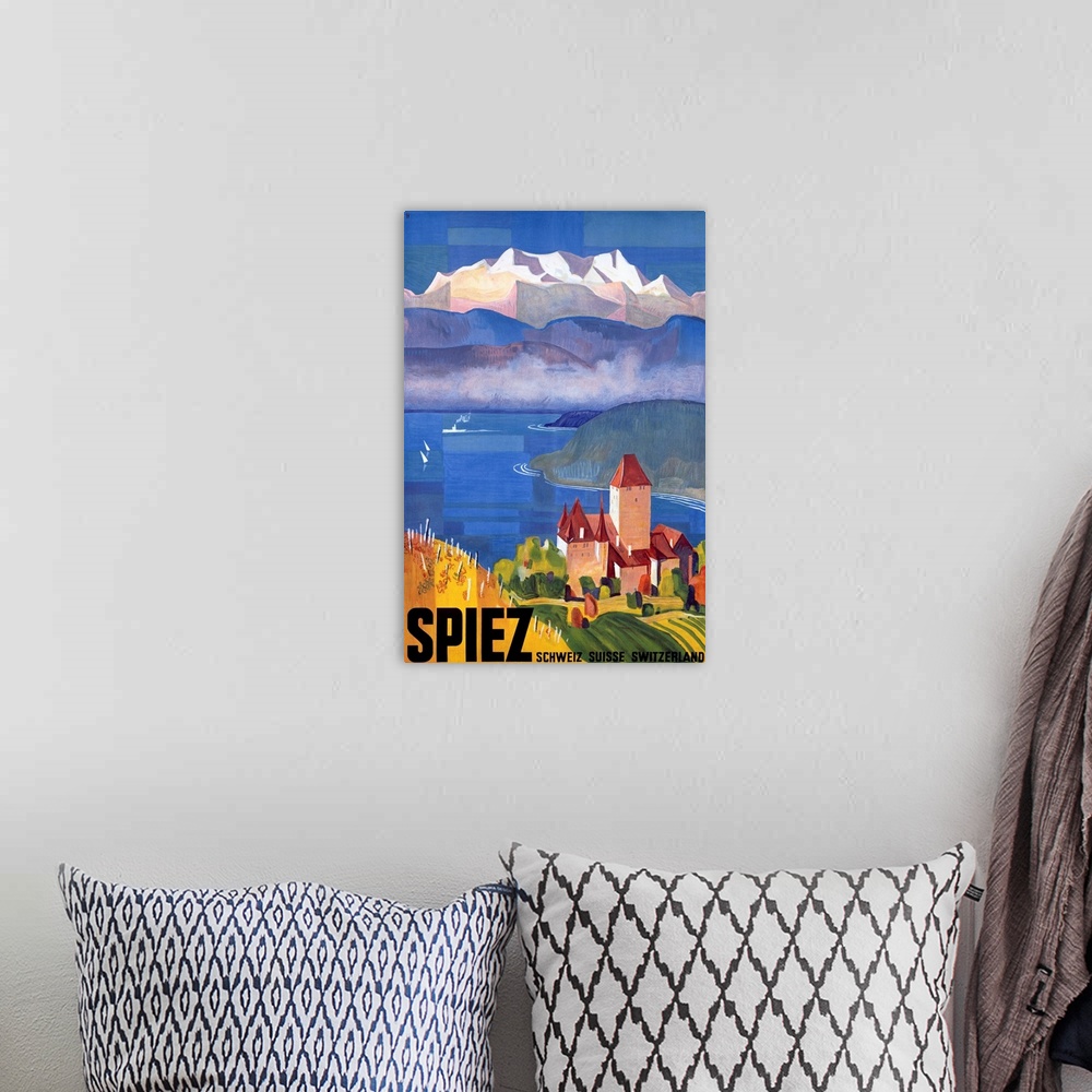 A bohemian room featuring Vintage artwork of a castle that sits on a body of water looking out onto immense hills and mount...