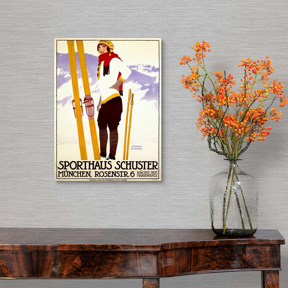 A traditional room featuring Vintage artwork of a female skier standing in front of a mountain view with her skis and poles pl...
