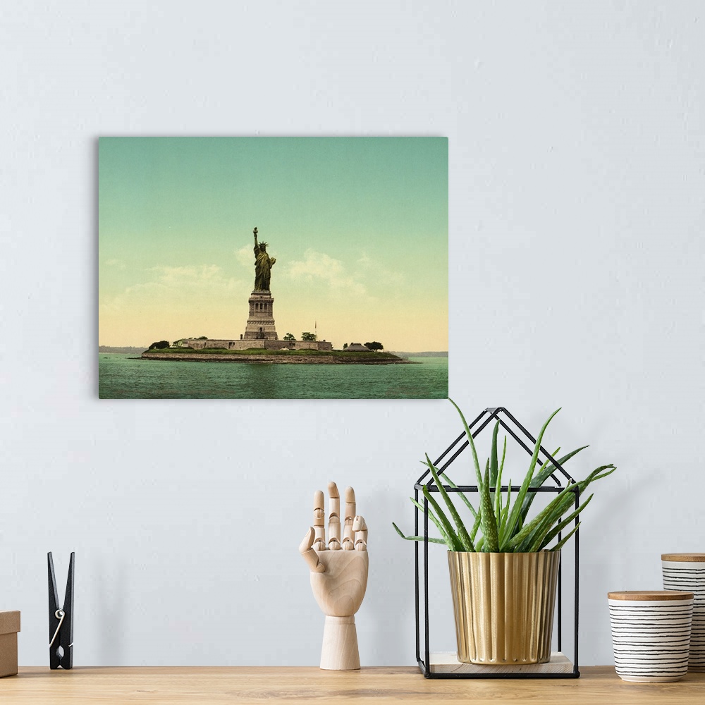 A bohemian room featuring Hand colored photograph of statue of liberty, New York harbor.