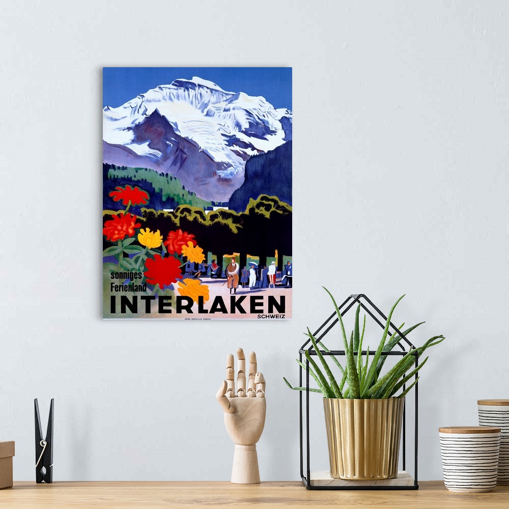 A bohemian room featuring Travel advertisement for Switzerland featuring flowers people strolling under the snowy peak of t...