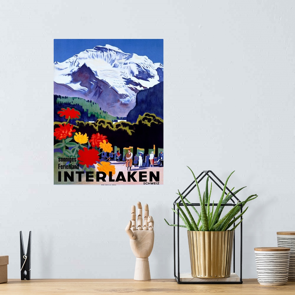 A bohemian room featuring Travel advertisement for Switzerland featuring flowers people strolling under the snowy peak of t...