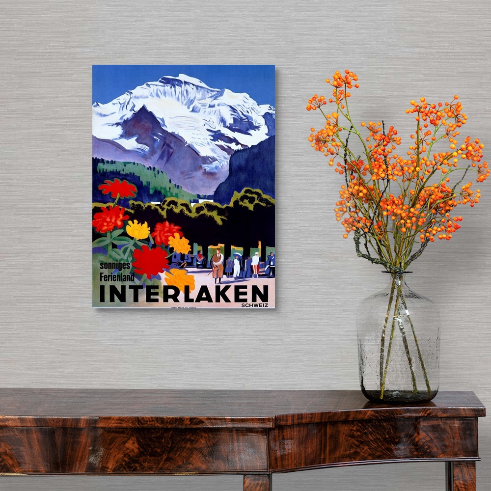 A traditional room featuring Travel advertisement for Switzerland featuring flowers people strolling under the snowy peak of t...