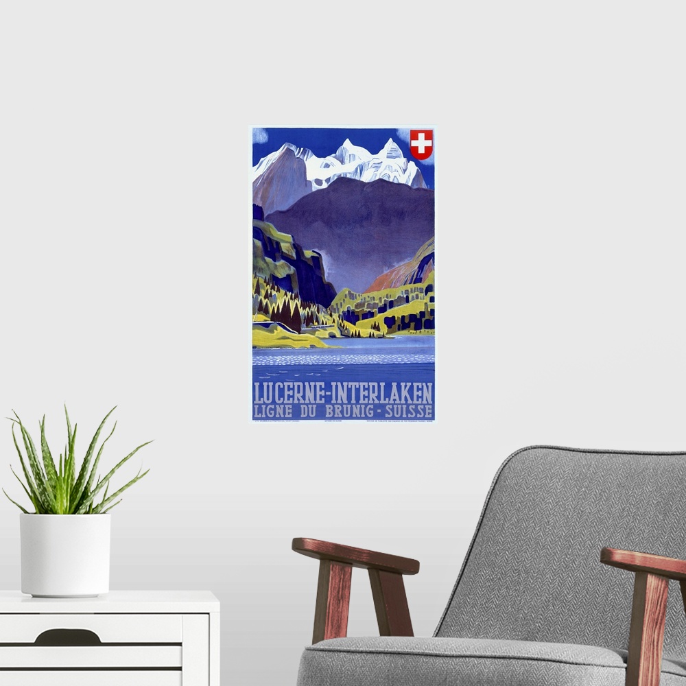 A modern room featuring Giant antique art displays a travel advertisement for a destination within the mountains of Switz...