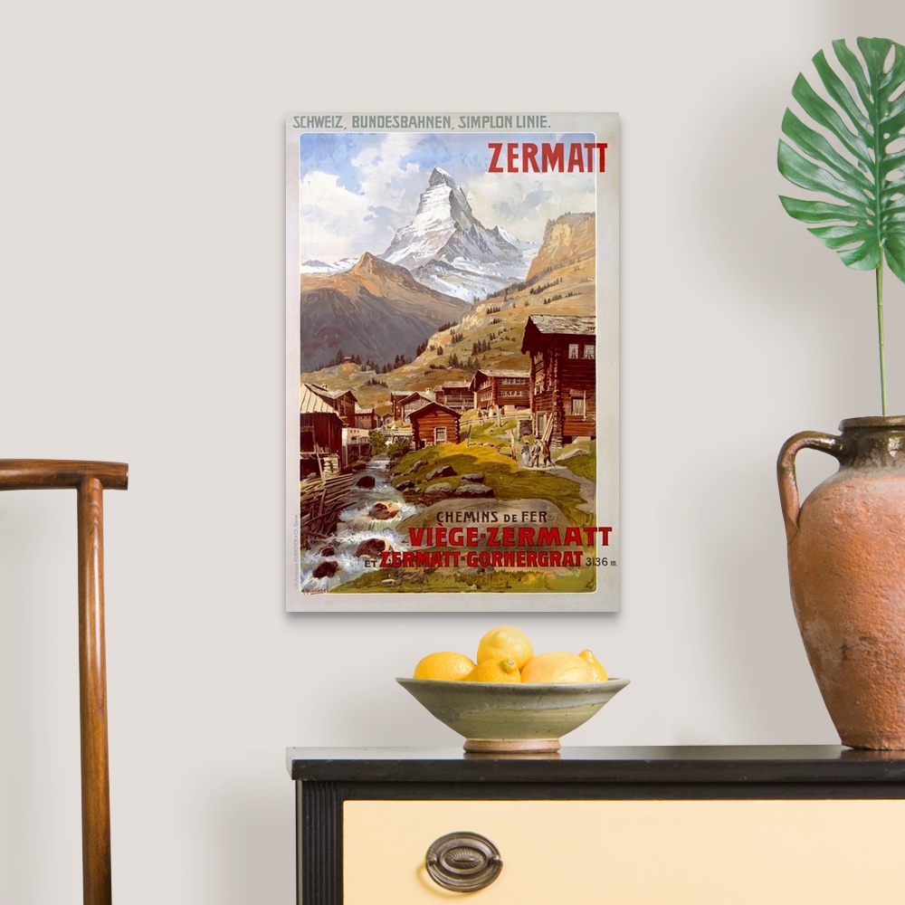 A traditional room featuring Vertical vintage poster, advertising the Swiss Alps in Zermatt.  Mountains behind a small village...