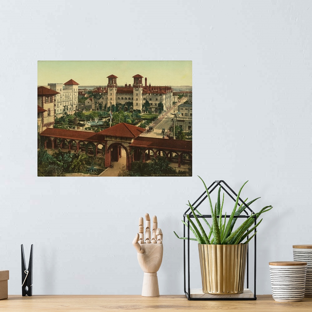 A bohemian room featuring Hand colored photograph of the alcazar, St. Augustine.