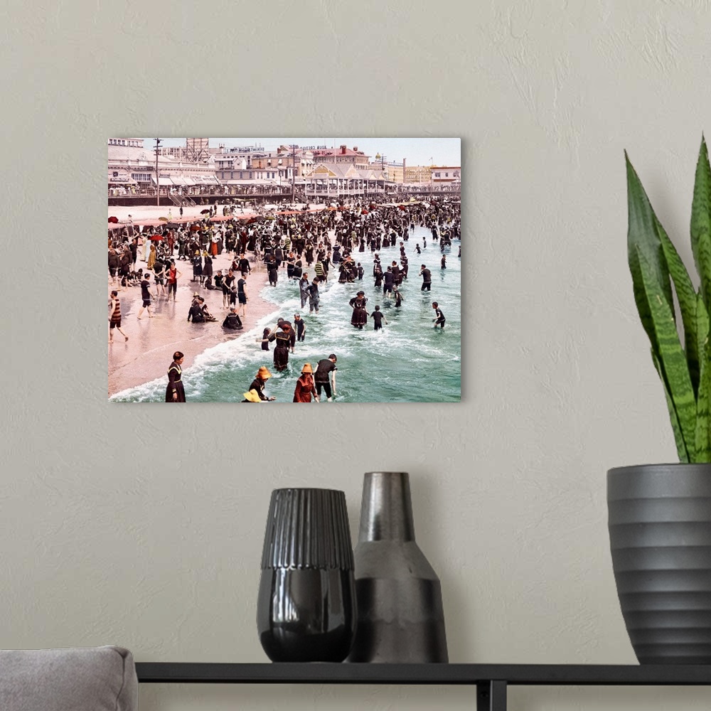 A modern room featuring Horizontal, vintage photograph of a beach crowded with people in Atlantic City, New Jersey.  The ...