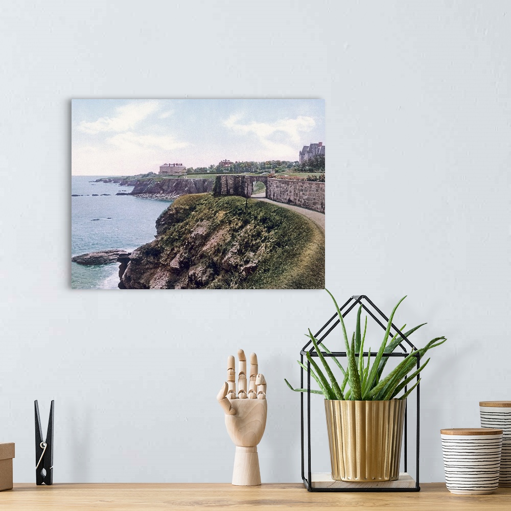A bohemian room featuring This large piece is a photograph taken of the cliff walk that lines the coast of Newport Rhode Is...