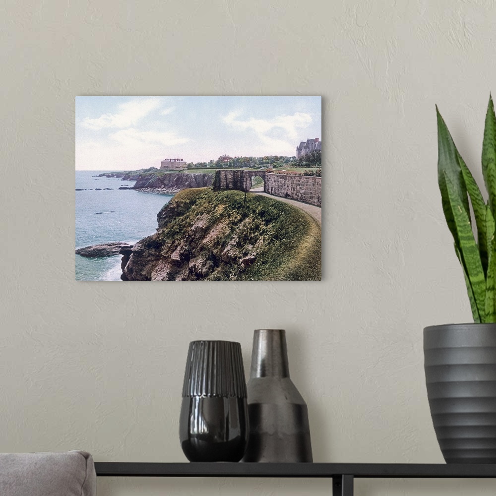 A modern room featuring This large piece is a photograph taken of the cliff walk that lines the coast of Newport Rhode Is...