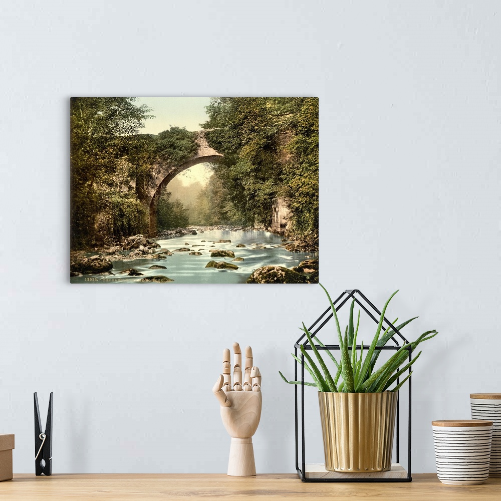 A bohemian room featuring Hand colored photograph of the Dargle bridge, country Wicklow, Ireland.
