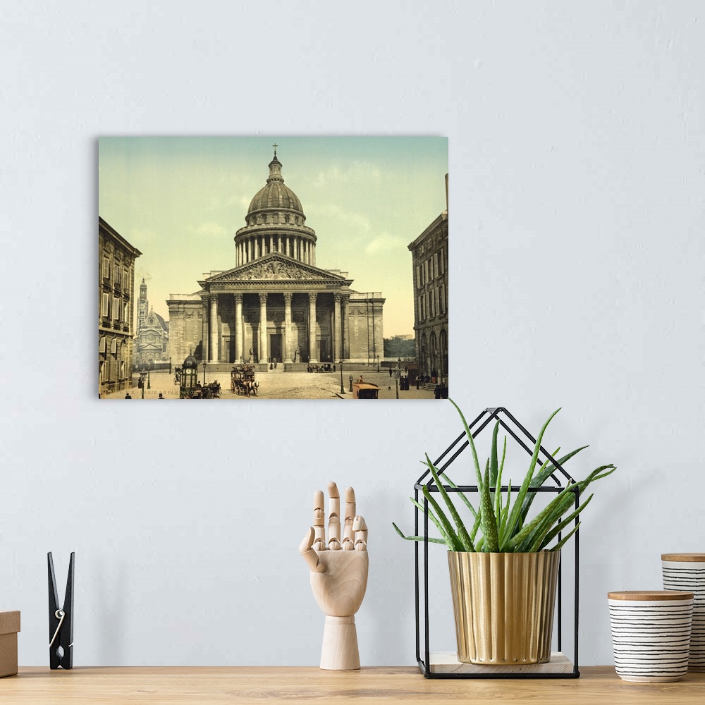 A bohemian room featuring Hand colored photograph of the pantheon, Paris, France.