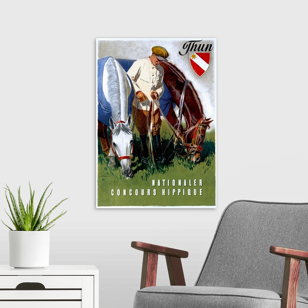 A modern room featuring Large antique poster of a man holding the reins of two horses on either side of him while they gr...