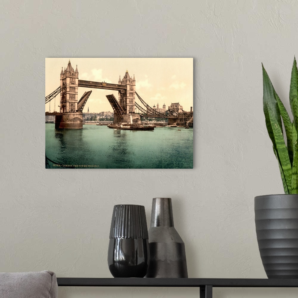 A modern room featuring Hand colored photograph of tower bridge, London.