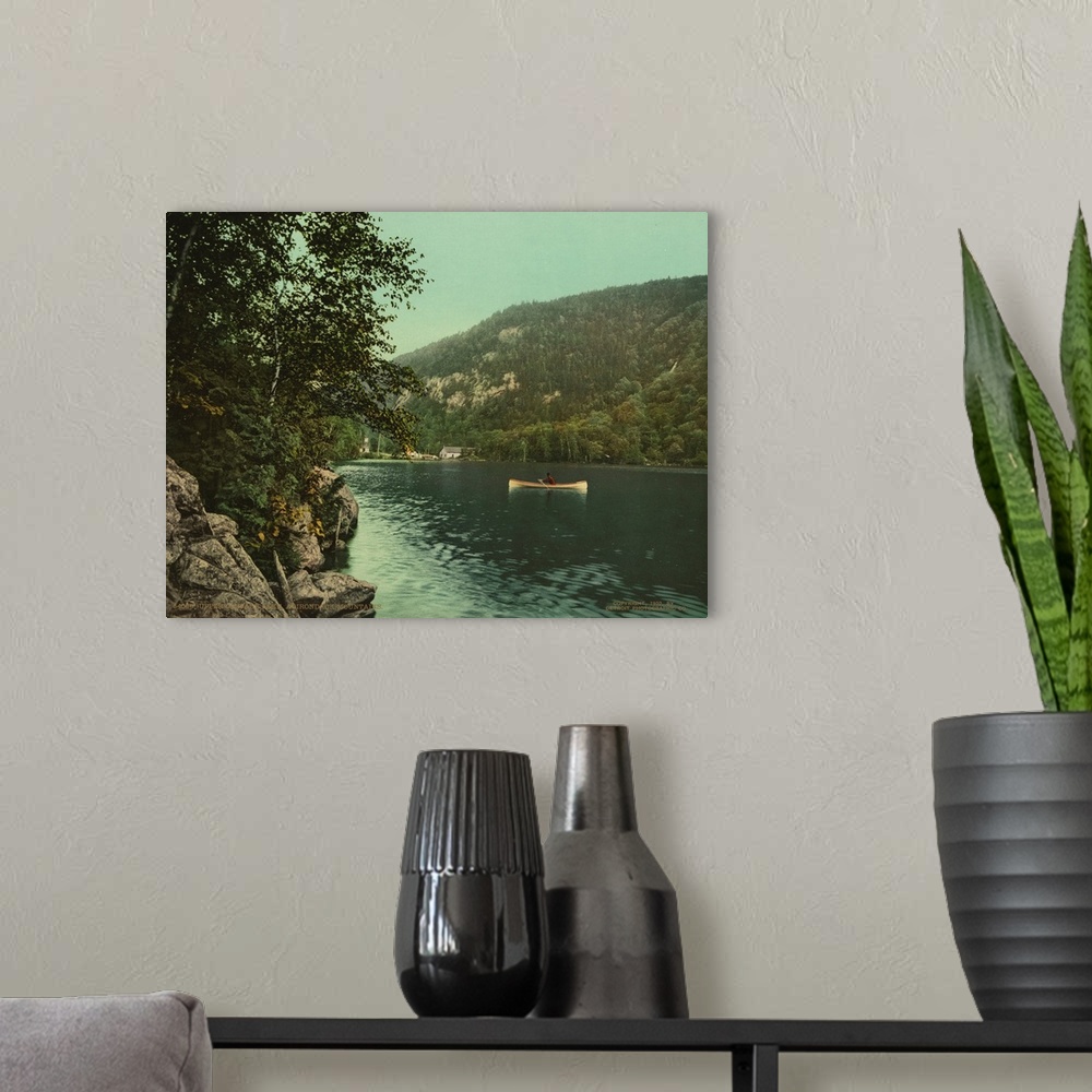 A modern room featuring Hand colored photograph of upper cascade lake, Adirondack mountains.