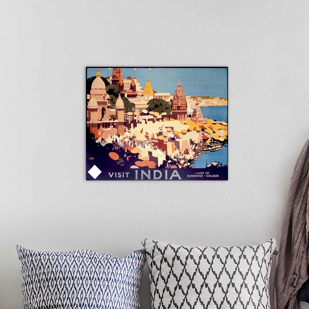 A bohemian room featuring Travel advertisement for India, the Land of Sunshine and Color, featuring the city of Varanasi.