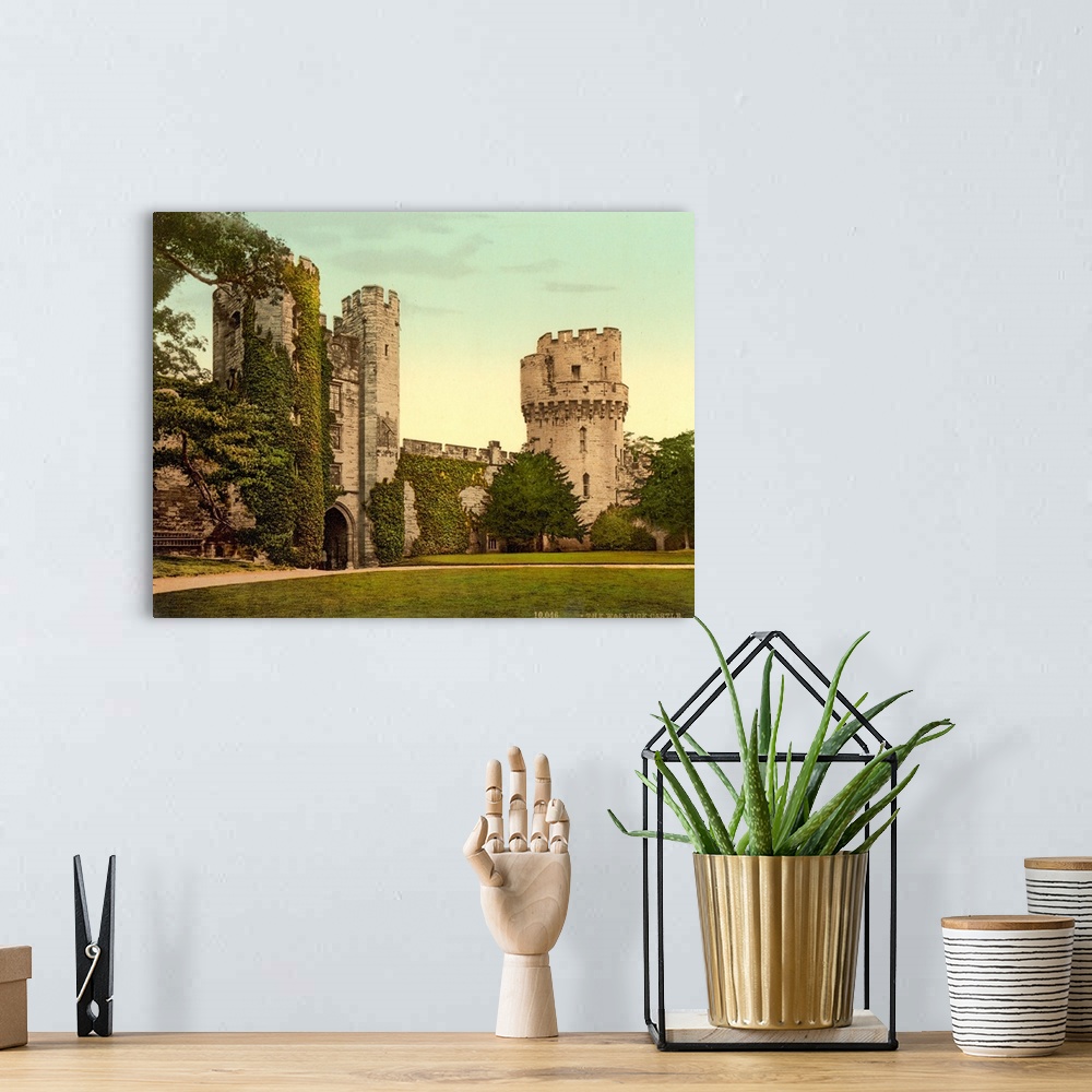 A bohemian room featuring Hand colored photograph of Warwick castle, England.