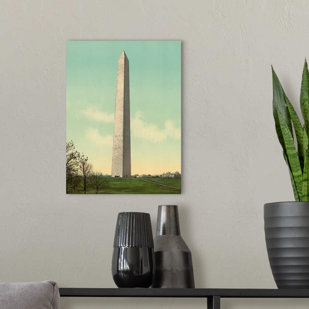 A modern room featuring Hand colored photograph of Washington monument.