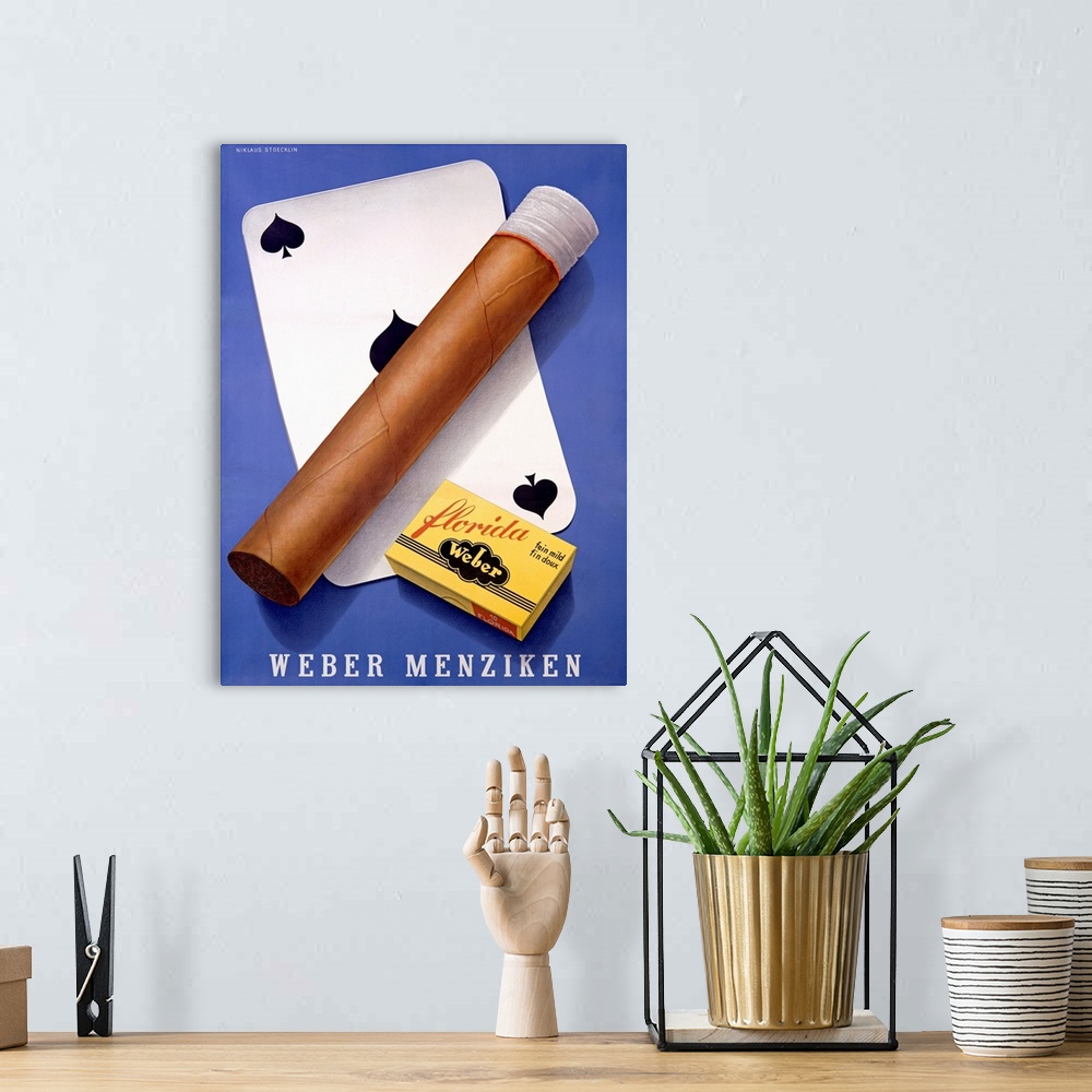 A bohemian room featuring Vintage poster of a lit cigar and match box placed over a card of spades.